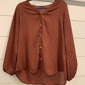 Red floral blouse